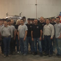 Ozzie's Body Shop - Team Ozzie's..dedicated to your total satisfaction!