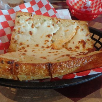 Rigatoni's Restaurant - Cheesy Garlic Bread ($5.19 with tax): 8/10. Tasty and cheesy. ... The pieces should have been sliced better. - Italian Near Me - Castro Valley, California Rigatoni's Restaurant - Cheesy Garlic Bread ($5.19 with tax): 8/10. Tasty and cheesy. ... The pieces should have been sliced better. - Italian Near Me - Castro Valley, California