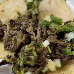 two tacos on a plate two tacos on a plate