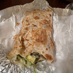 Tacos Del Pilo - Fajita burrito, lettuce, avocado, cheese, tomatoes.