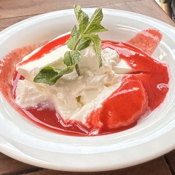 Le Petit Châtelet - Cheese with Fruit Sauce and Fresh Mint - Dessert. - French Near Me - Paris, 75 Le Petit Châtelet - Cheese with Fruit Sauce and Fresh Mint - Dessert. - French Near Me - Paris, 75