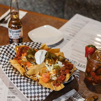 Ten22 Tavern - a plate of nachos and a bottle of beer - Bars Near Me - Elmer, New Jersey Ten22 Tavern - a plate of nachos and a bottle of beer - Bars Near Me - Elmer, New Jersey