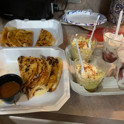 Chicken birria tacos, elote corn in a cup, strawberry's and cream. $36 and no onions and cilantro for tacos. Little disappointed.
