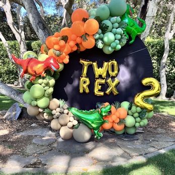 MotherHustler Customs - Two Rex themed balloon arch - Balloon Services Near Me
