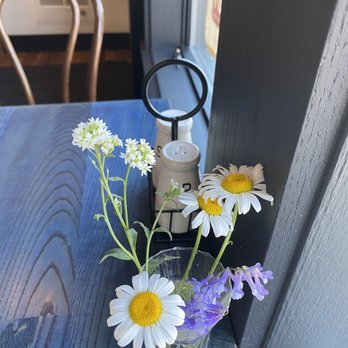Tilly's - Table settings with cute wildflowers - Coffee & Tea Near Me - Rhinelander, Wisconsin