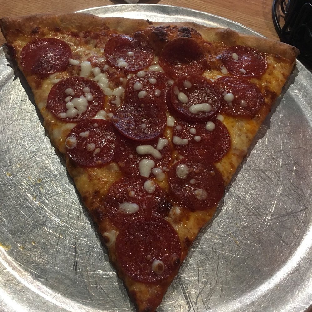 Rock'n Dough Pizza + Brew - Pepperoni slice - Pizza Near Me - Germantown, Tennessee Rock'n Dough Pizza + Brew - Pepperoni slice - Pizza Near Me - Germantown, Tennessee
