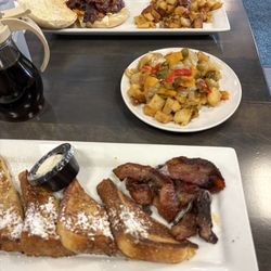 Eggsquisite Eats - French toast, bacon, hashbrowns with peppers and onions, bacon egg and cheese on a hard roll