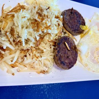 Rise and Dine - Breakfast with over medium eggs, sausage patties, hashbrowns, white toast not shown - Breakfast & Brunch Near Me - Gaylord, Michigan Rise and Dine - Breakfast with over medium eggs, sausage patties, hashbrowns, white toast not shown - Breakfast & Brunch Near Me - Gaylord, Michigan