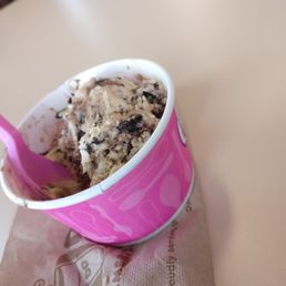 Small ice cream cup, minus a bite. Small ice cream cup, minus a bite.