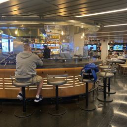 The bar seating area where you can watch them make your food. The bar seating area where you can watch them make your food.