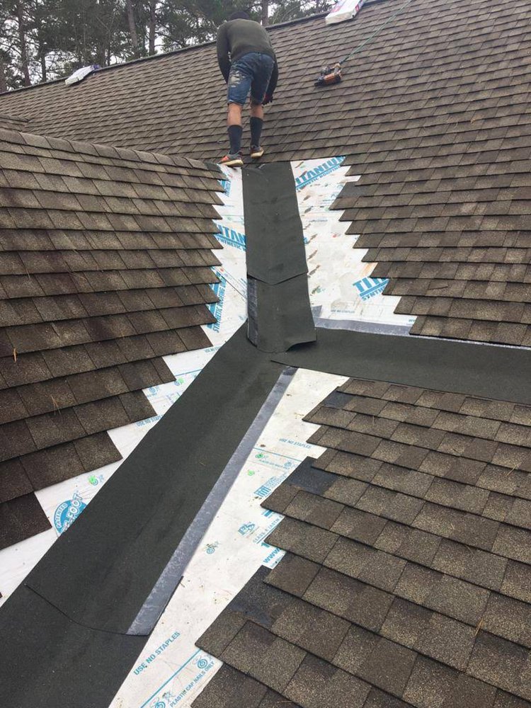 Slide of Rocco’s Roofing