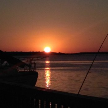 Dock Store - the sun setting over the water - Burgers Near Me - Ingleside, Texas Dock Store - the sun setting over the water - Burgers Near Me - Ingleside, Texas
