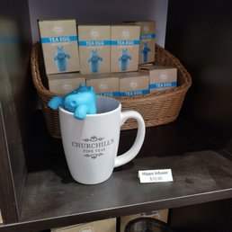 a cup of tea on a shelf
