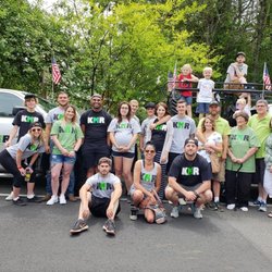 Kitsap Moss Removal - Our KMR and Bateman families, together for July 4th parade on Bainbridge Island. We handed out 4,000 water bottles!#watertheisland2018