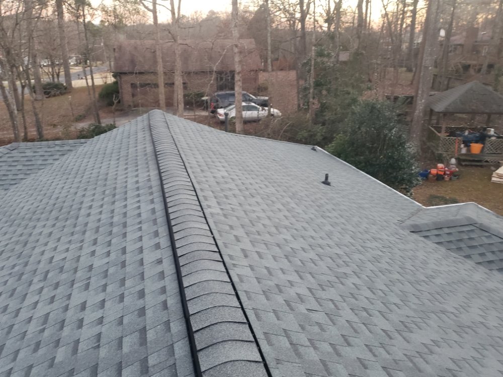 Slide of Real Deal Roofing