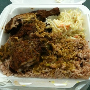 Potluck Restaurant - Jerk chicken with curry duck sauce, w/ coleslaw and rice and peas - Caribbean Near Me - Mississauga, Ontario