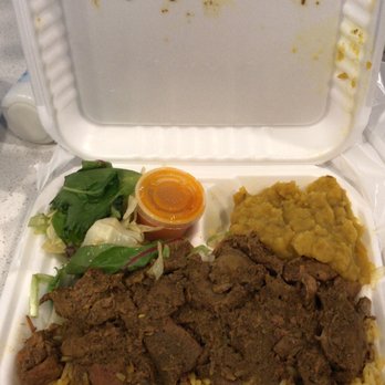 Tropical Paradise - a take out container of food - Caribbean Near Me - Montreal, Quebec Tropical Paradise - a take out container of food - Caribbean Near Me - Montreal, Quebec