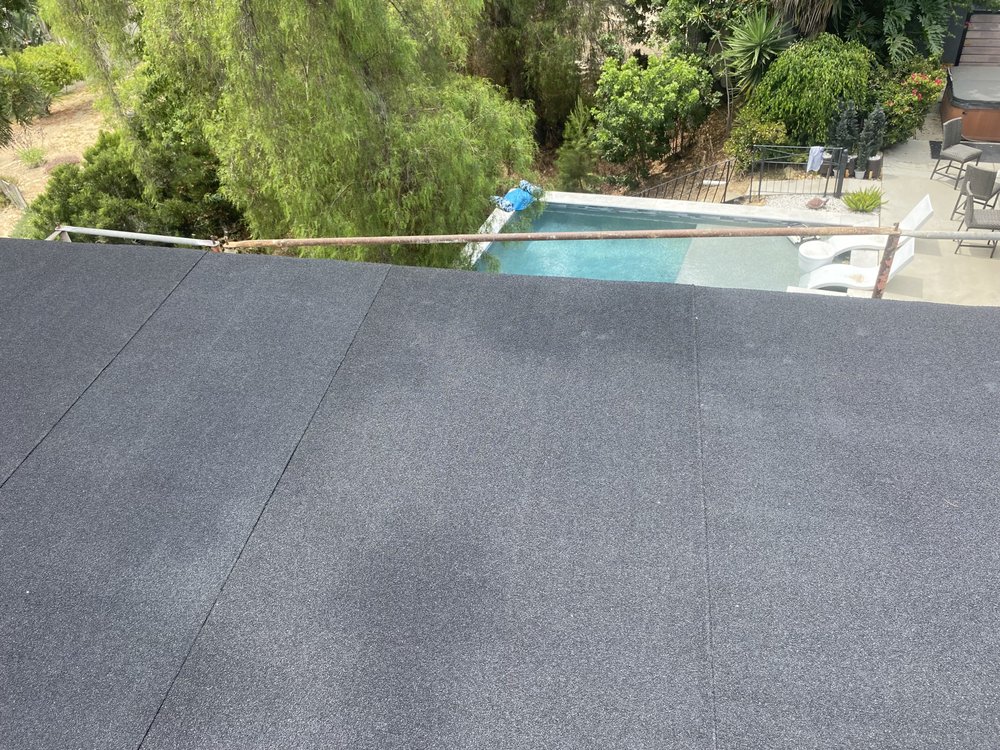 Slide of JUVA Roofing