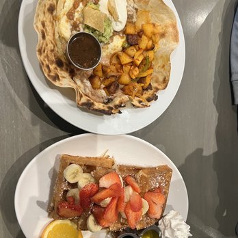 Waypoint Cafe - Huevos Rancheros Belgian and Banana Nut Waffle(minus the nuts added the strawberries) - American Near Me - Camarillo, California Waypoint Cafe - Huevos Rancheros Belgian and Banana Nut Waffle(minus the nuts added the strawberries) - American Near Me - Camarillo, California