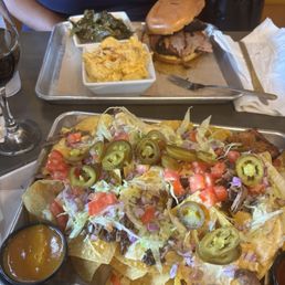I had the 56 Nachos with brisket, and my BFF had the Brisket Sandwich with Macaroni & Cheese and Collard Greens. We enjoyed them both. I had the 56 Nachos with brisket, and my BFF had the Brisket Sandwich with Macaroni & Cheese and Collard Greens. We enjoyed them both.