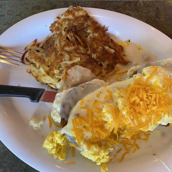Rutherford's 66 Diner - Country Benedict (biscuits with sausage, eggs, cheese, and gravy) with hash browns - Diners Near Me - Kingman, Arizona Rutherford's 66 Diner - Country Benedict (biscuits with sausage, eggs, cheese, and gravy) with hash browns - Diners Near Me - Kingman, Arizona