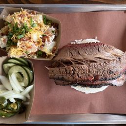 Brisket, baked potato, and onion mix. Brisket, baked potato, and onion mix.