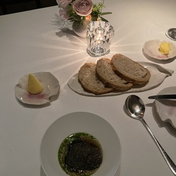 Jean-Georges - Black Truffles over Winter Mushroom Ravioli - French Near Me - New York, New York Jean-Georges - Black Truffles over Winter Mushroom Ravioli - French Near Me - New York, New York