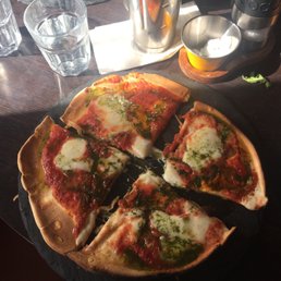 Traditional margarita pizza (vegetarian) Traditional margarita pizza (vegetarian)