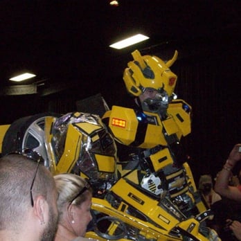 Boston Comic Con 2013 - insane Transformer costumed attendee towers above everyone - Festivals Near Me - Boston, Massachusetts Boston Comic Con 2013 - insane Transformer costumed attendee towers above everyone - Festivals Near Me - Boston, Massachusetts