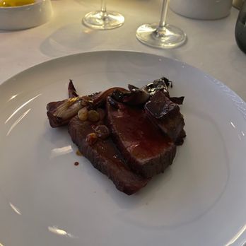 Armani Ristorante - 50 day dry aged beef, caramelized radicchio, raisins, olives - Italian Near Me - New York, New York Armani Ristorante - 50 day dry aged beef, caramelized radicchio, raisins, olives - Italian Near Me - New York, New York