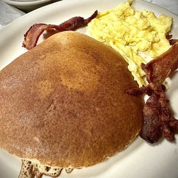 Caracheo's Mexican Restaurant - Pancake Plate w/ 2 Eggs & 2 Strips of Bacon - Mexican Near Me - San Antonio, Texas Caracheo's Mexican Restaurant - Pancake Plate w/ 2 Eggs & 2 Strips of Bacon - Mexican Near Me - San Antonio, Texas