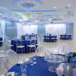 Pure Banquet Hall - Elegant blue-and-white banquet setup with chandeliers and modern lighting at Pure Banquet Hall in Lake Balboa, CA -- perfect for events!