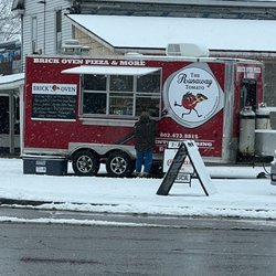 The Runaway Tomato Pizza - Hard to miss when he's there. It's a busy corner by Cumberland Farms.