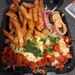 Chicken over rice with salad and fries! Huge portions! Chicken over rice with salad and fries! Huge portions!