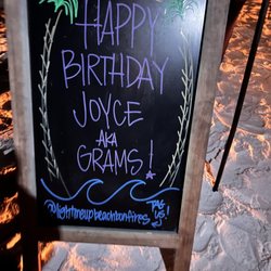 Light Me Up Beach Bonfires - Chalkboard sign was an awesome touch! Grams felt special!