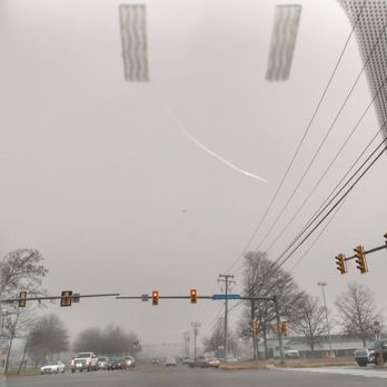 Priority Toyota Springfield - Crack in windshield, "Spring Mall Dr" road sign clearly visible. - Car Dealers Near Me - Springfield, Virginia