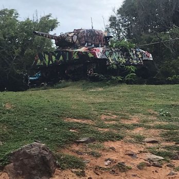 Flamenco Beach - One of the tanks. The other is by the water. - Beaches Near Me