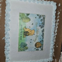 Panaderia Acambaro Gto - This is the cake I picked up. The printed edible paper did not cover the entire cake, and it had cracks in it.