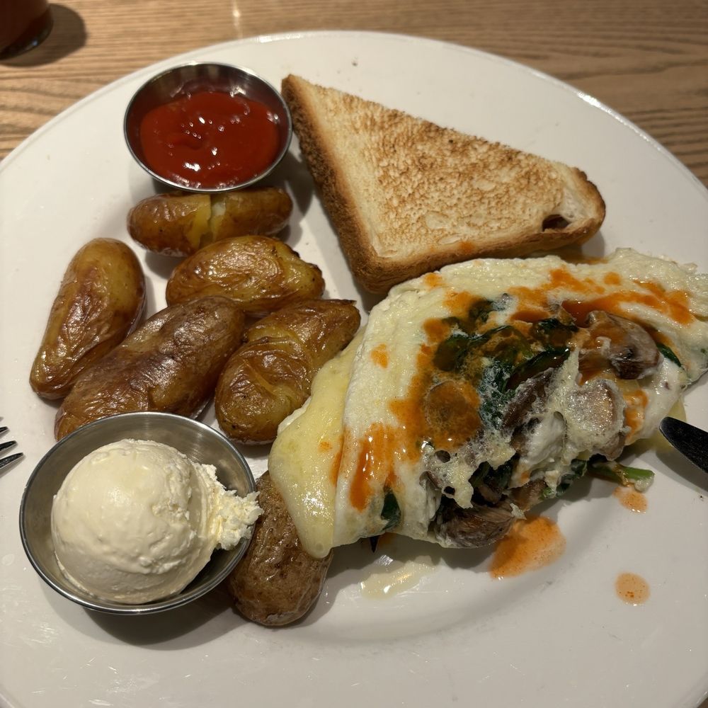 Corinne Denver - Mushroom and spinach omelette with potatoes and Toast - Breakfast & Brunch Near Me - Denver, Colorado Corinne Denver - Mushroom and spinach omelette with potatoes and Toast - Breakfast & Brunch Near Me - Denver, Colorado
