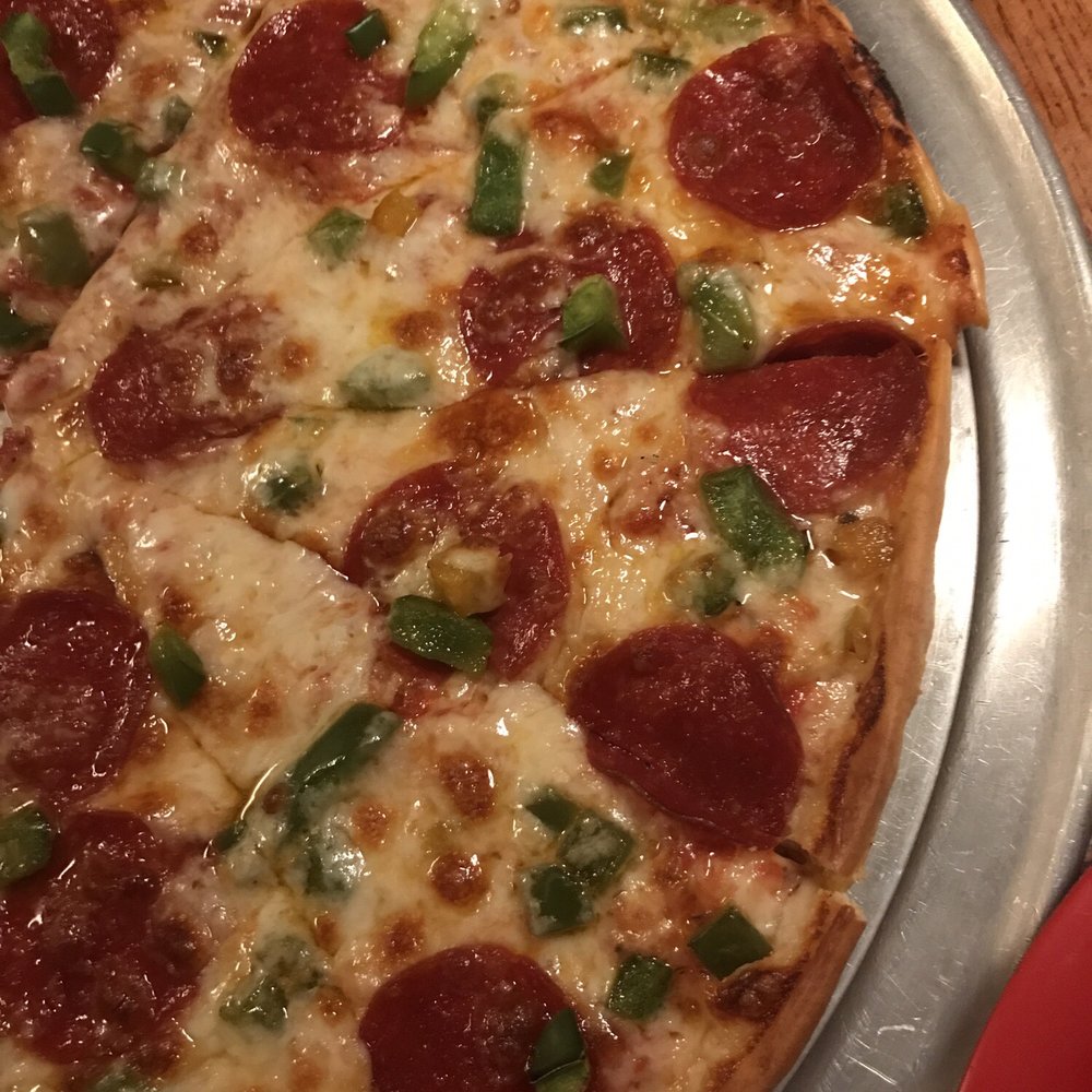 Thin crust with pepperoni and bell peppers Thin crust with pepperoni and bell peppers