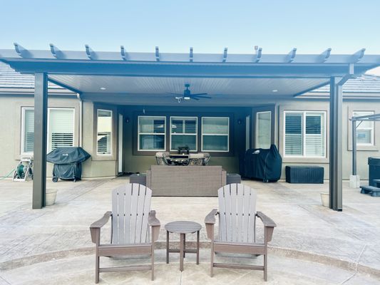 Pebble creek 2 tone - This two-tone patio cover blends perfectly with the stucco exterior and tile roof color. Padgett and sons extended the built in existing cover to provide a larger shaded area. Pebble creek 2 tone - This two-tone patio cover blends perfectly with the stucco exterior and tile roof color. Padgett and sons extended the built in existing cover to provide a larger shaded area.