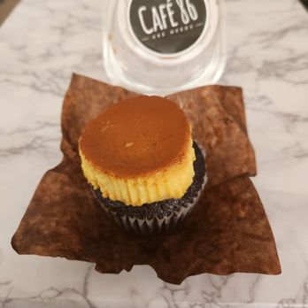 Cafe 86 - Ube leche flan cupcake ($4.50):  the leche flan was dry, and the cupcake was even dryer & flavorless, 5/10. - Desserts Near Me - San Diego, California