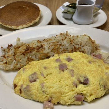 Omega Restaurant & Bakery - Ham and cheese omelette with hash browns and pancakes. - Bakeries Near Me - Niles, Illinois Omega Restaurant & Bakery - Ham and cheese omelette with hash browns and pancakes. - Bakeries Near Me - Niles, Illinois
