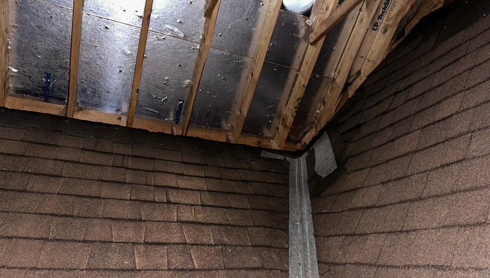 Slide of Ruff Roofing