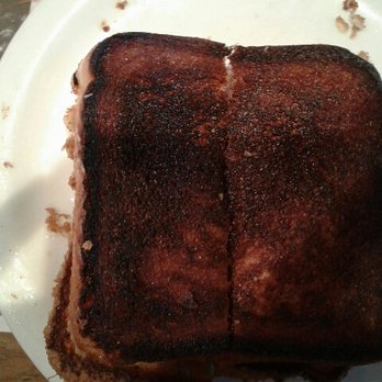 Denny's - Burnt French Toast and this was underside,  so when you get this, you think it's perfect until you flip it over... - American Near Me - Chula Vista, California