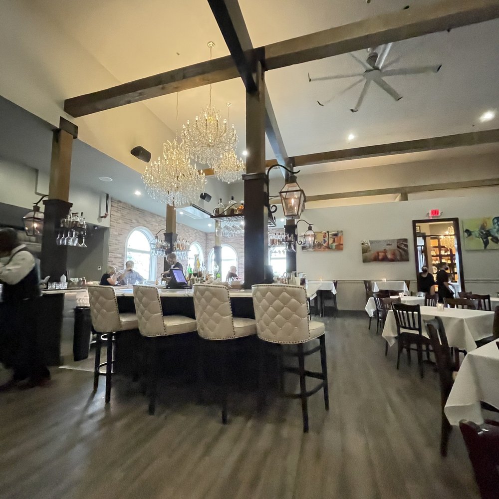 Marais - One of several bars with beautiful chandeliers. - Seafood Near Me - Dickinson, Texas
