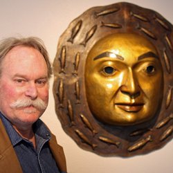 Carrie Goller Gallery - Northwest Coast artist, James Bender with bronze moon mask