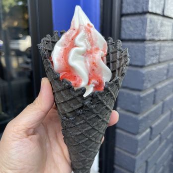 Indigo Cow - Soft serve with strawberry syrup in a cone (small) - Ice Cream & Frozen Yogurt Near Me - Seattle, Washington Indigo Cow - Soft serve with strawberry syrup in a cone (small) - Ice Cream & Frozen Yogurt Near Me - Seattle, Washington