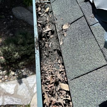 Brigham Gutter Cleaning & Repair - More dirt and leaves blocking this rain gutter from draining properly and causing leaks. - Gutter Services Near Me Brigham Gutter Cleaning & Repair - More dirt and leaves blocking this rain gutter from draining properly and causing leaks. - Gutter Services Near Me