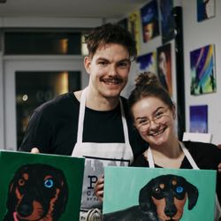 Raw Canvas - Couples enjoying a Paint Your Pet class in Calgary. A relaxed, creative night turning beloved pets into personalized art.
